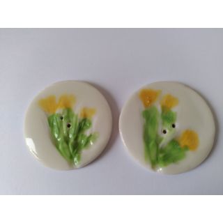 Two Cowslip buttons