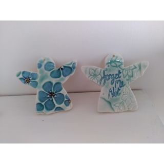 Two large porcelain angels