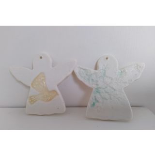 Two large porcelain angels
