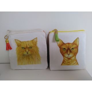 Two ginger cat zipped pouches